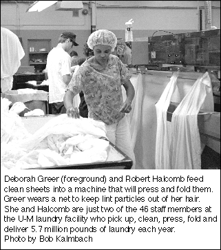 Greer and Halcomb in the laundry facility