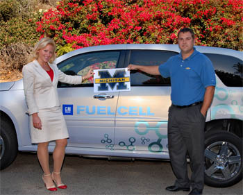 U-M alums Angela Coletti and Alex Keros play key roles in GM's Project Driveway, a first step toward building the vehicles and infrastructure for a hydrogen-powered economy. (Photo courtesy General Motors.)