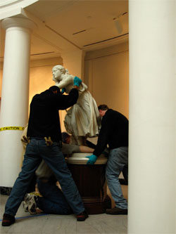 Workers return 'Nydia' to her home in the original wing of the University of Michigan art museum. (Photo courtesy U-M Museum of Art.)