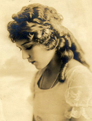 Mary Pickford, 'America's Sweetheart' and one of Hollywood's greatest stars and most powerful women, made her film debut in 1909.