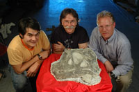 Jeff Wilson (U-M), Dan Chure (NPS), and Brooks Britt (BYU) pose with the holotypic skull of Abydosaurus mcintoshi, a newly discovered sauropod dinosaur. (Photo: Brooks Britt.)