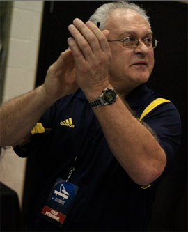 All year, men's gymnastics coach Kurt Golder preached mental toughness. The team slogan was 'Blame no one. Blame nothing. Be prepared to handle everything.' During the turbulent national championship meet, the Wolverines would need all the mental toughness they could find. (Photo: U-M Media Relations.)