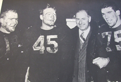 By 1947, Crisler's 'spindly-legged freshmen' had matured into the Mad Magicians, one of the most powerful teams ever assembled. (left to right: Bump Elliott, Pete Elliott, Crisler and Bruce Hilkene. Photo courtesy U-M Bentley Historical Library.)