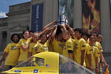 Solar car team celebrates victory. (Photo: Alex Dowling.)