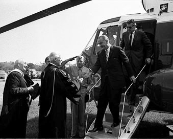 Gov. George Romney greets LBJ as he descends from the helicopter. (Image courtesy of U-M Bentley Historical Library.)