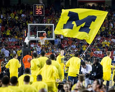 Michigan's colors fly high at the 2013 NCAA Basketball Tournament championship game April 8, 2013. (Image: Eric Bronson,  Michigan Photography.)