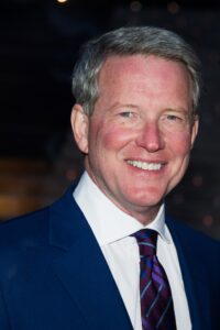 David Westin grew up in Flint, attended U-M as an undergraduate and for law school, and has been president of ABC News since 1997. In his office he keeps a football signed by Bo Schembechler. (Photo by Charles Sykes)