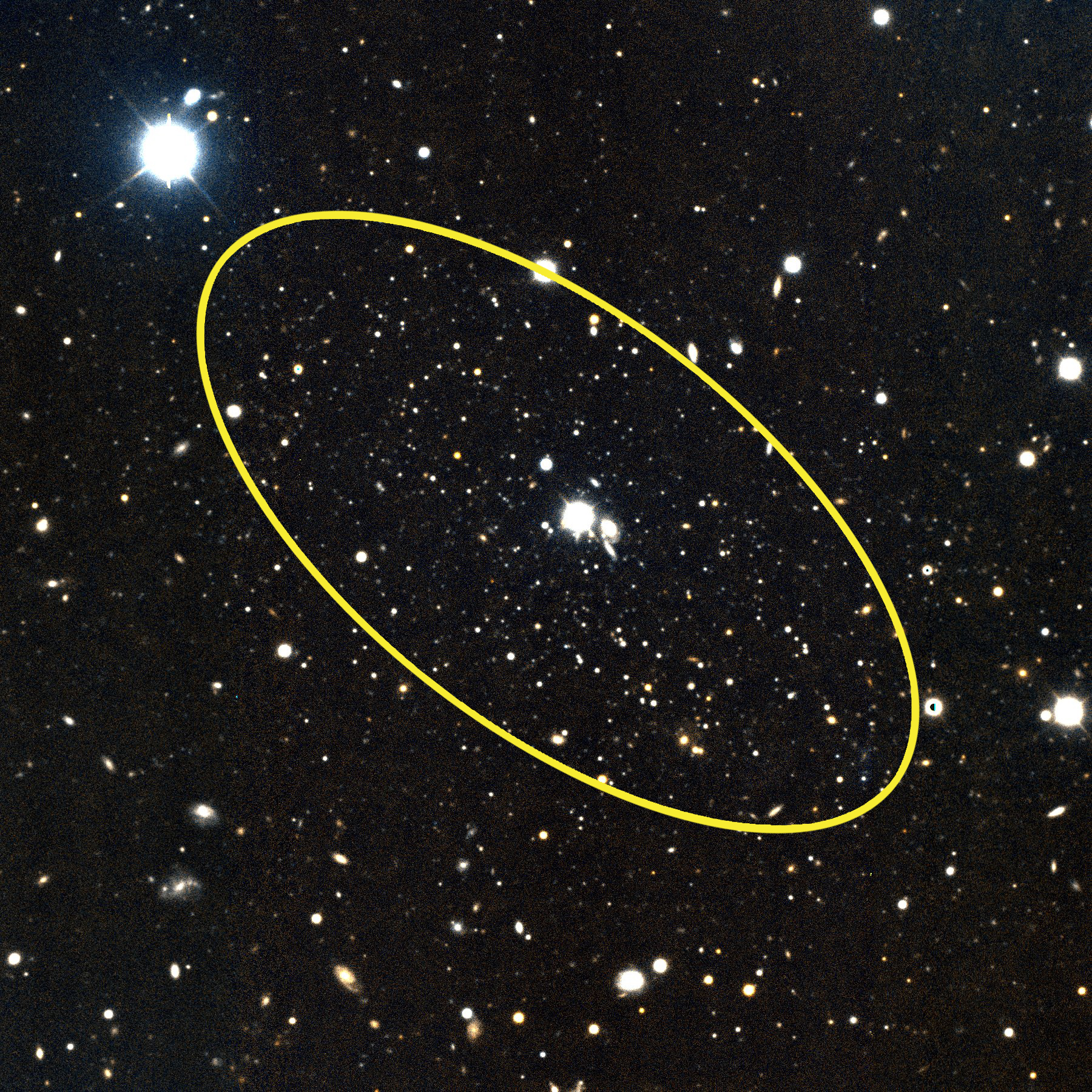 The circled cluster of stars is the dwarf galaxy Andromeda 29. The bright star within the circle is a foreground star in our own Milky Way galaxy. Credit: Gemini Observstory/AURA/Eric Bell