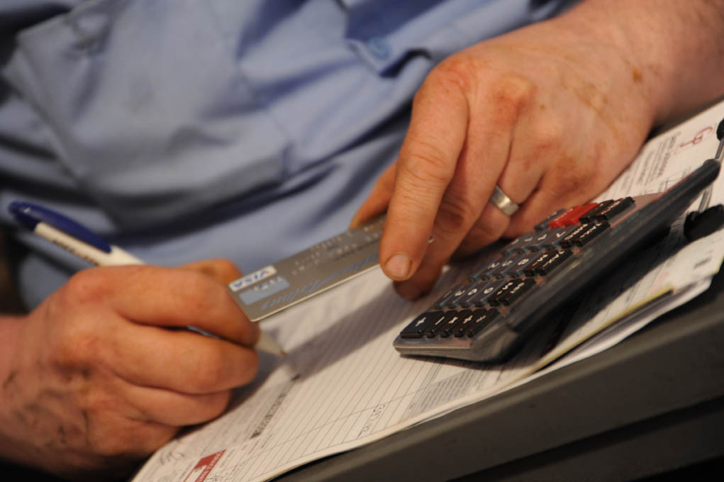Paying bills image courtesy of FlickR.com user Wonderlane