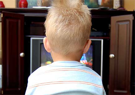 Pre-schooler watching television image courtesy of sxc.hu user Annalog85