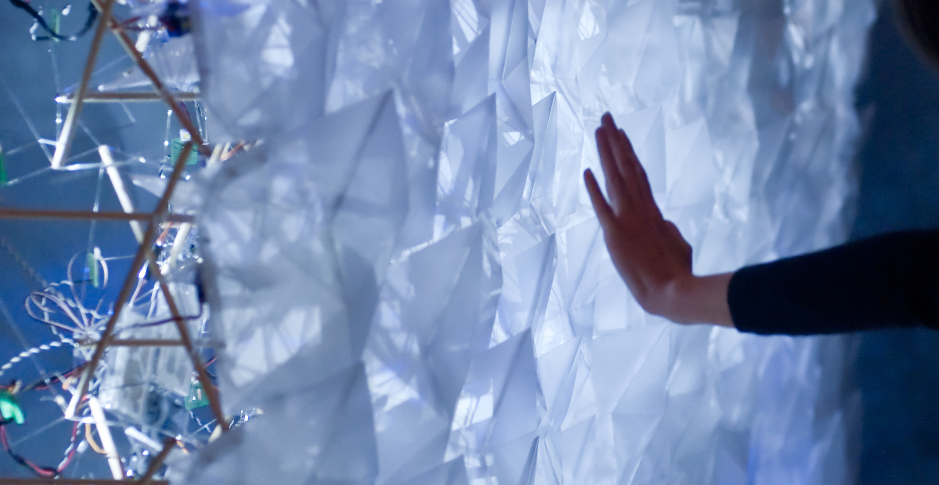 Panels like this responsive envelope system prototype could line the interior walls of tomorrow's smart buildings, responding dynamically to human interaction, and adjusting to meet lighting and climate control needs. Image credit: Peter Smith