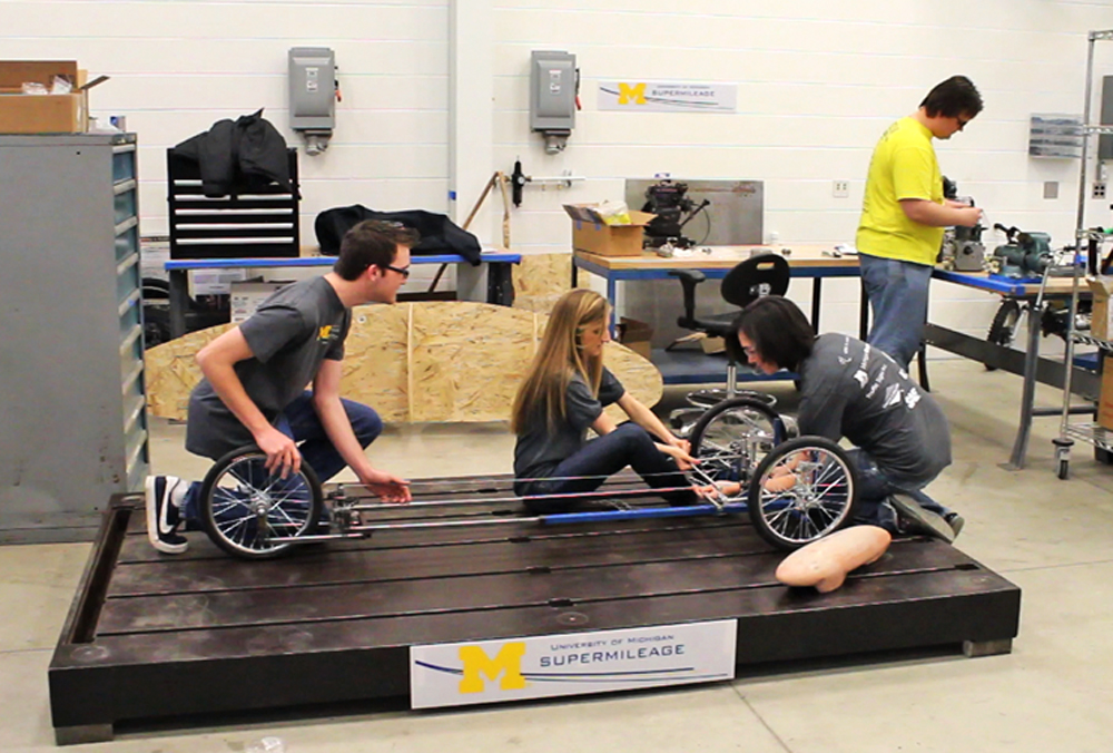 Members of the 2012 University of Michigan Supermileage Team work on their steering linkage in their workshop at the Wilson Center. Image credit: Evan Dougherty