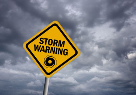 Storm warning sign over stormy sky (stock image)