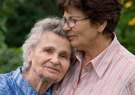 Photo of an elderly woman with her daughter (stock image)