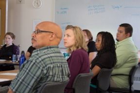 ISR Survey Research Center Summer Internship Program Director George Myers and interns from both the SRC program and the Summer Intern program sponsored by the ISR Inter-university Consortium for Political and Social Research (ICPSR) listen to a presentation about the Survey Research Operations unit. Image credit: Eva Menezes