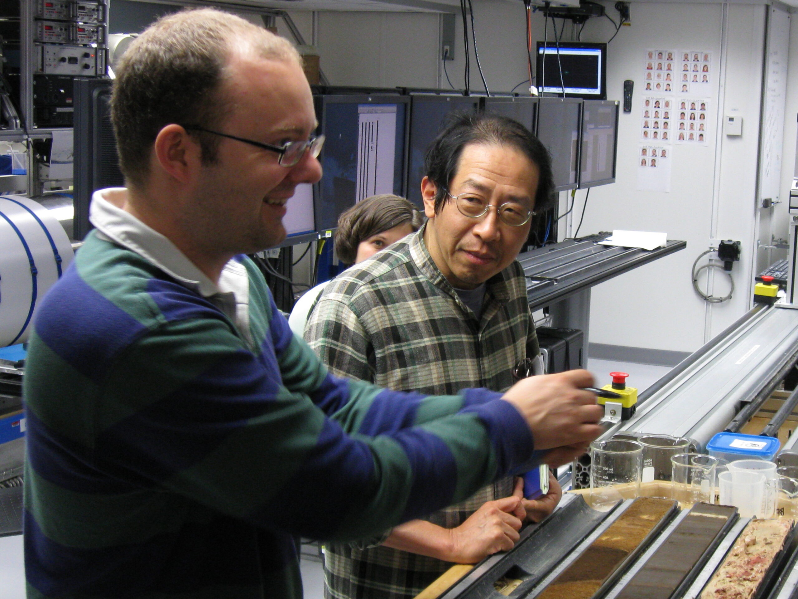 Expedition 320 Co-chief Scientists Heiko Pälike (University of Bremen, Germany) and Hiroshi Nishi (Hokkaido University, Japan) in the Core Lab. Image credit: Integrated Ocean Drilling Program/United Stated Implementing Organization (IODP/USIO)
