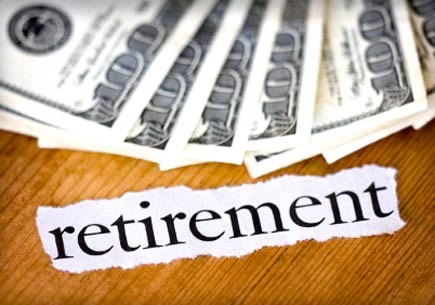 Hundred dollar bills with the word "retirement." (stock image)