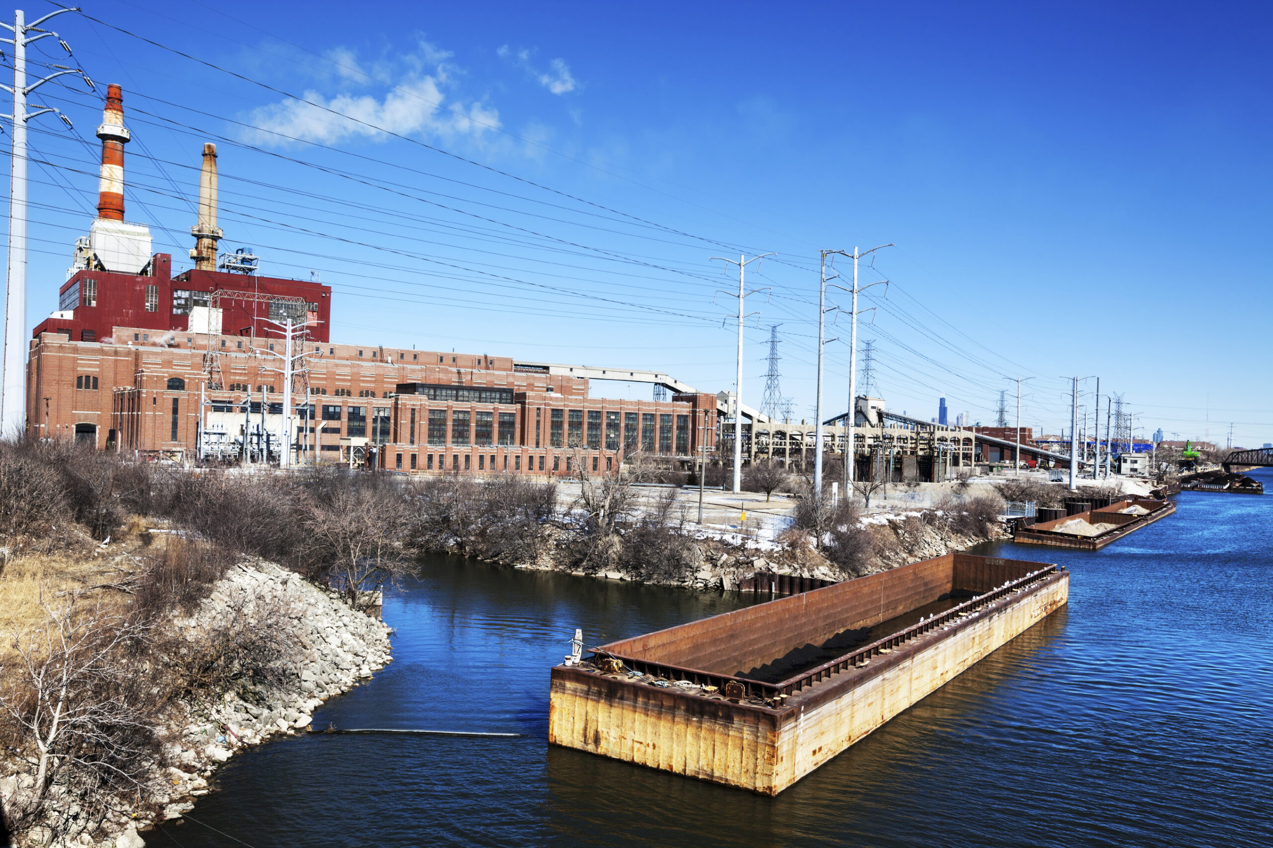 Coal plants like this one in West Chicago release mercury into the atmosphere which can end up in the water supply. This plant, the Crawford Generating Station, is among the last coal-fired plants to shut down in the city, and this move could help bring the already low mercury content in nearby Lake Michigan down even further. Image credit: Steve Geer, Chicago Image Gate