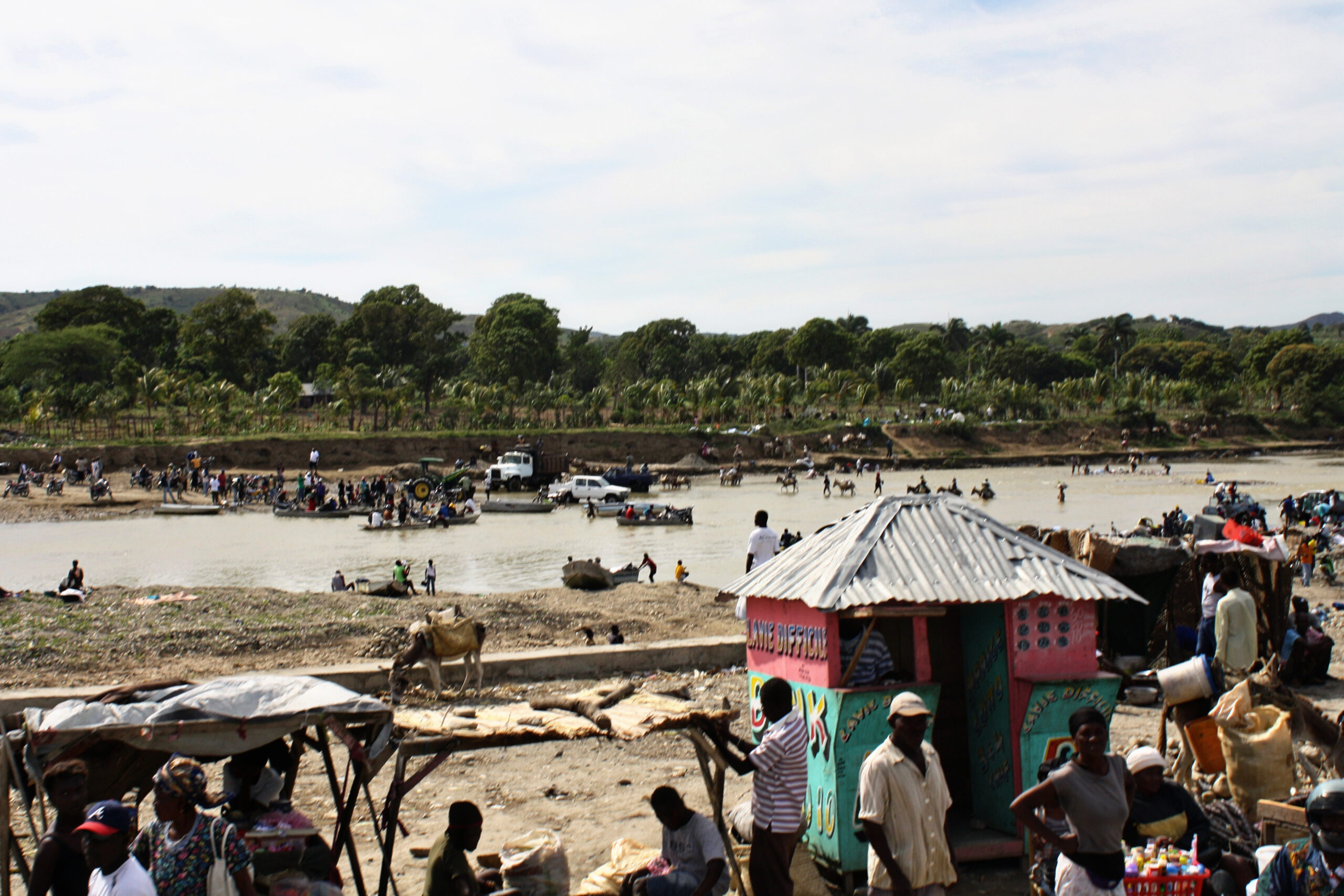 In northwest Haiti, rivers serve as the public carwash, bath house, restroom, and drinking source. Image courtesy of Feed My Starving Children: www.fmsc.org