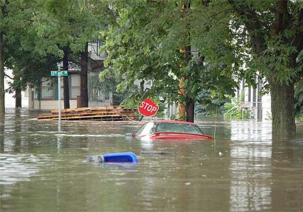 A flooded urban street. Image credit: Don Becker, USGS