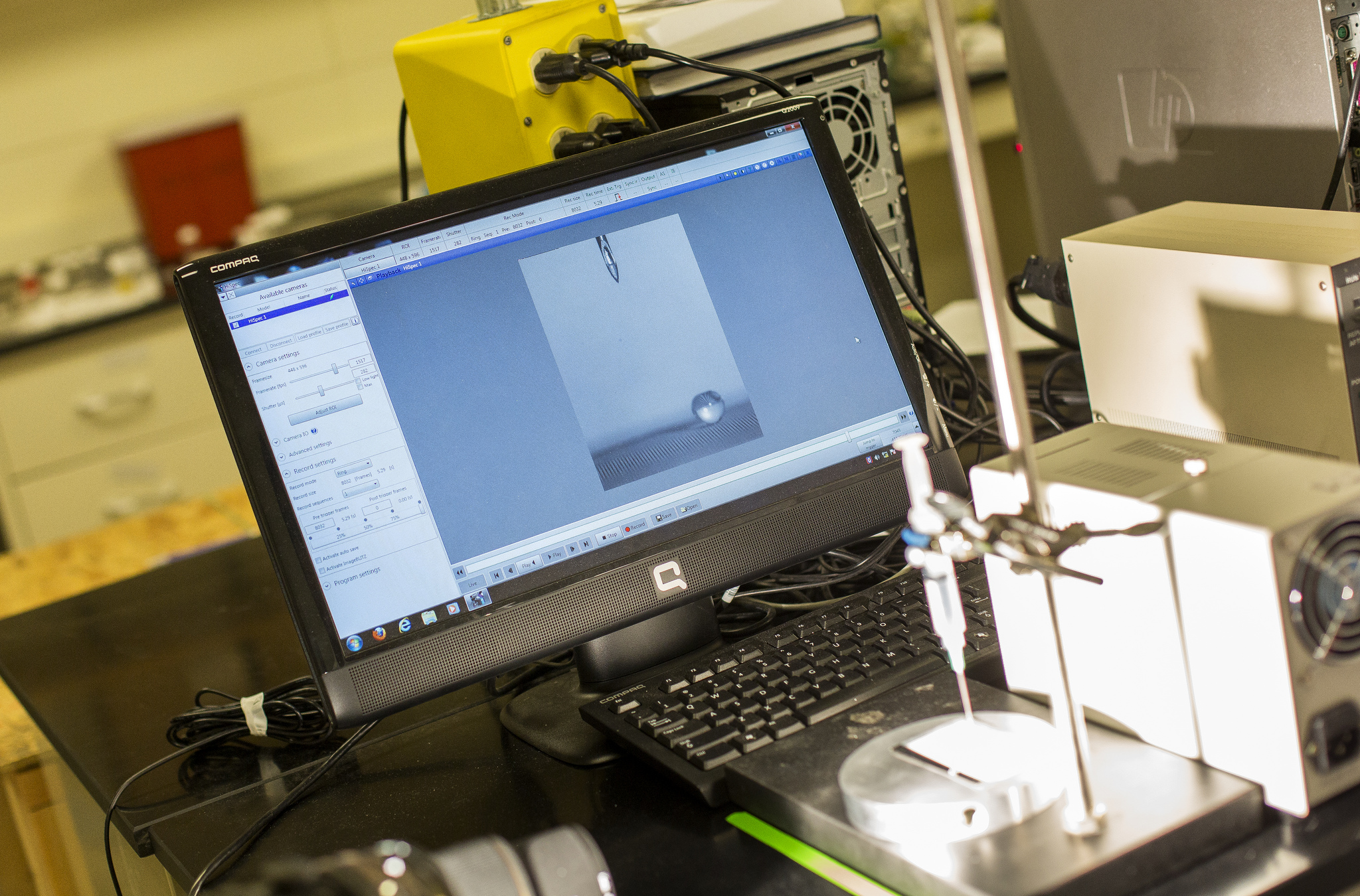 A high-speed camera captures a droplet resting on the surface of a new super-repellant surface developed at the University of Michigan. Image credit: Joseph Xu