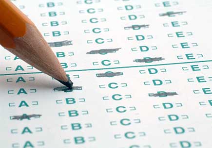 A pencil filling in a testing sheet. (stock image)