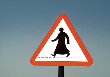 Pedestrian sign in Doha, Qatar. (stock image)