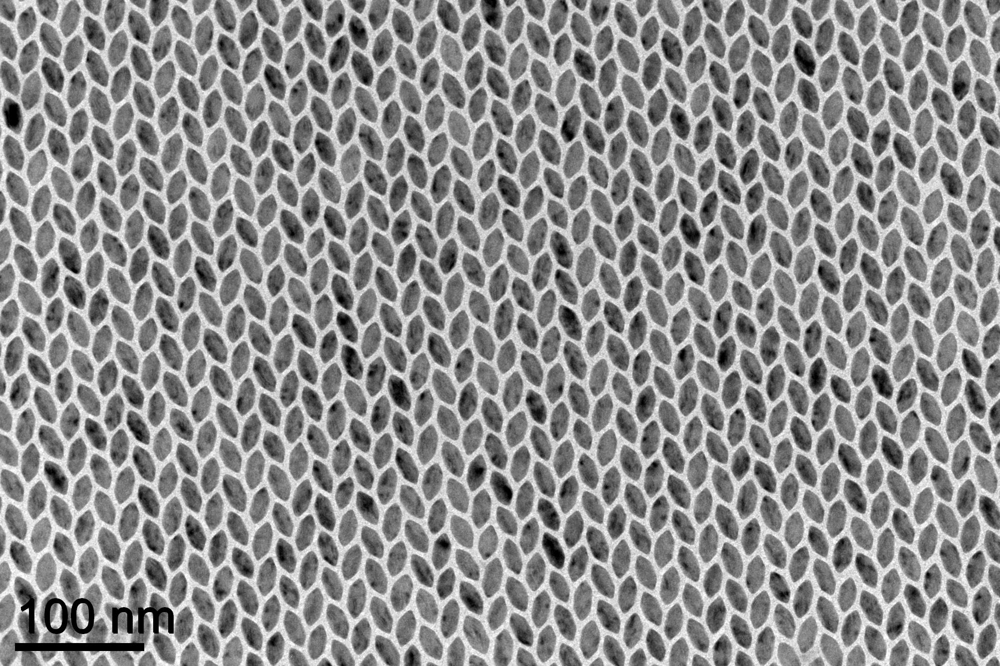 Hexagon-shaped nanoplates arranged themselves into different crystal patterns, depending on the length of the sides of the hexagons. Long hexagons fit together in a grid like a stretched honeycomb, but researchers were surprised that hexagons whose sides were all the same lengths ended up in a herringbone pattern. University of Michigan engineering researchers helped figure out why, and the work could lead to a new tool to control how nanoparticles arrange themselves. Credit: Xingchen Ye, University of Pennsylvania