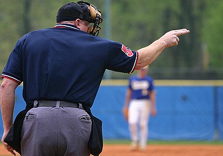 An umpire calling strike two. (stock image)