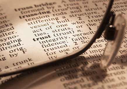 Photo of a dictionary definition of trust. (stock image)