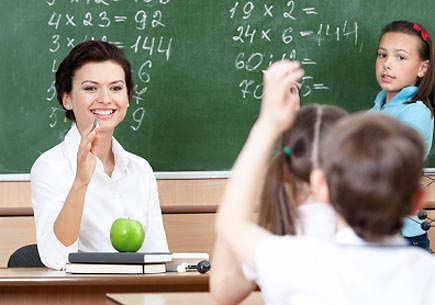 Beautiful teacher questions pupils at algebra. (stock image)