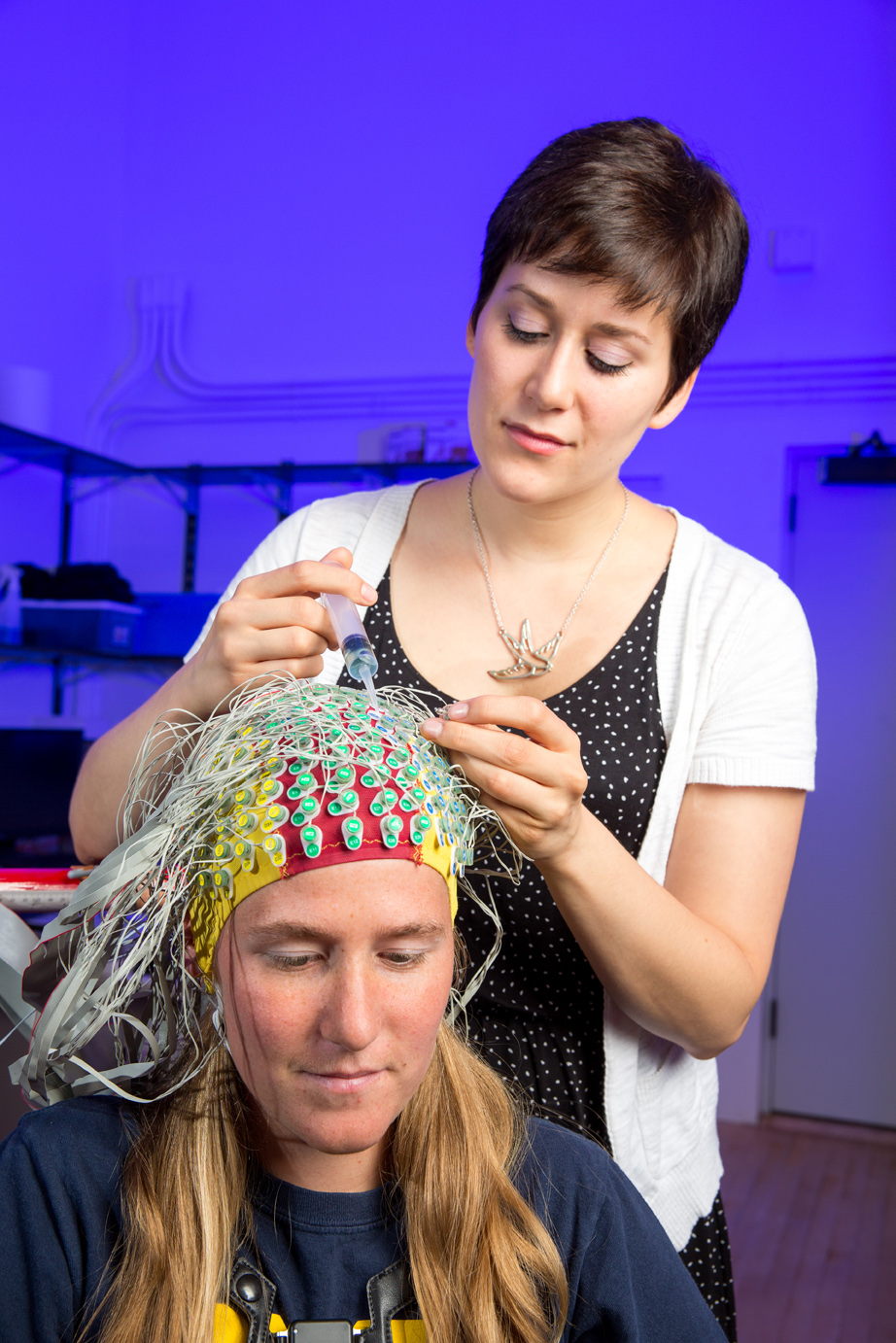 Subject being fitted with electrodes, which will help researchers look at his brain activity during a fall. Image credit: Ferris Lab