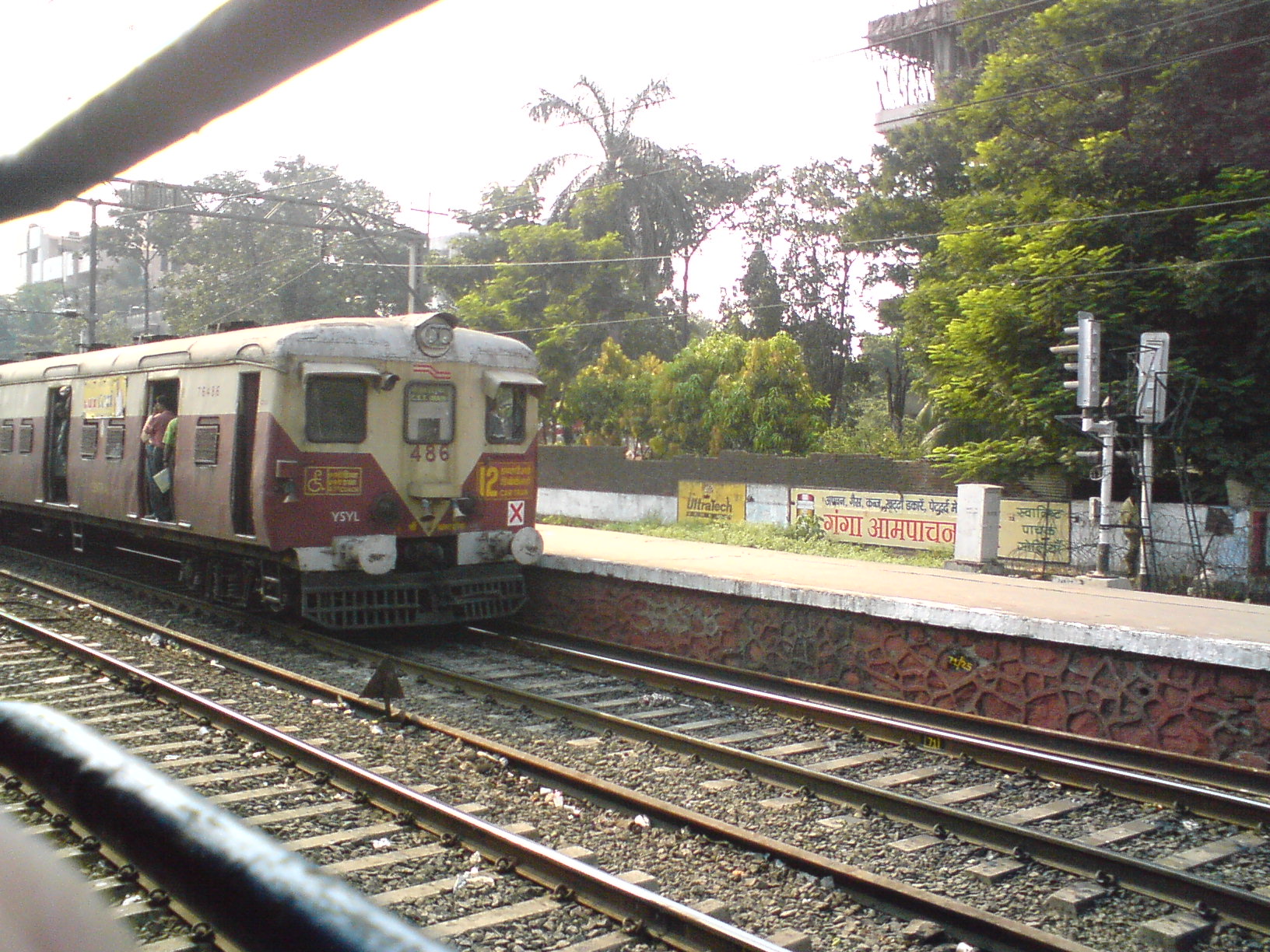 The front face of a local train in Mumbai. Image credit: flickr.com user Grey Rocker