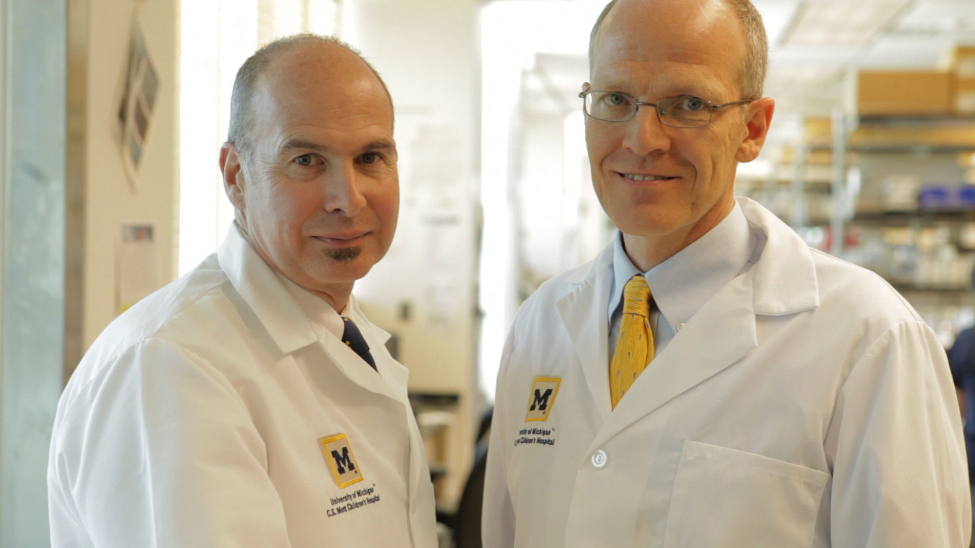 Scott Hollister, Ph.D., is at left, Glenn Green, M.D., is at right.