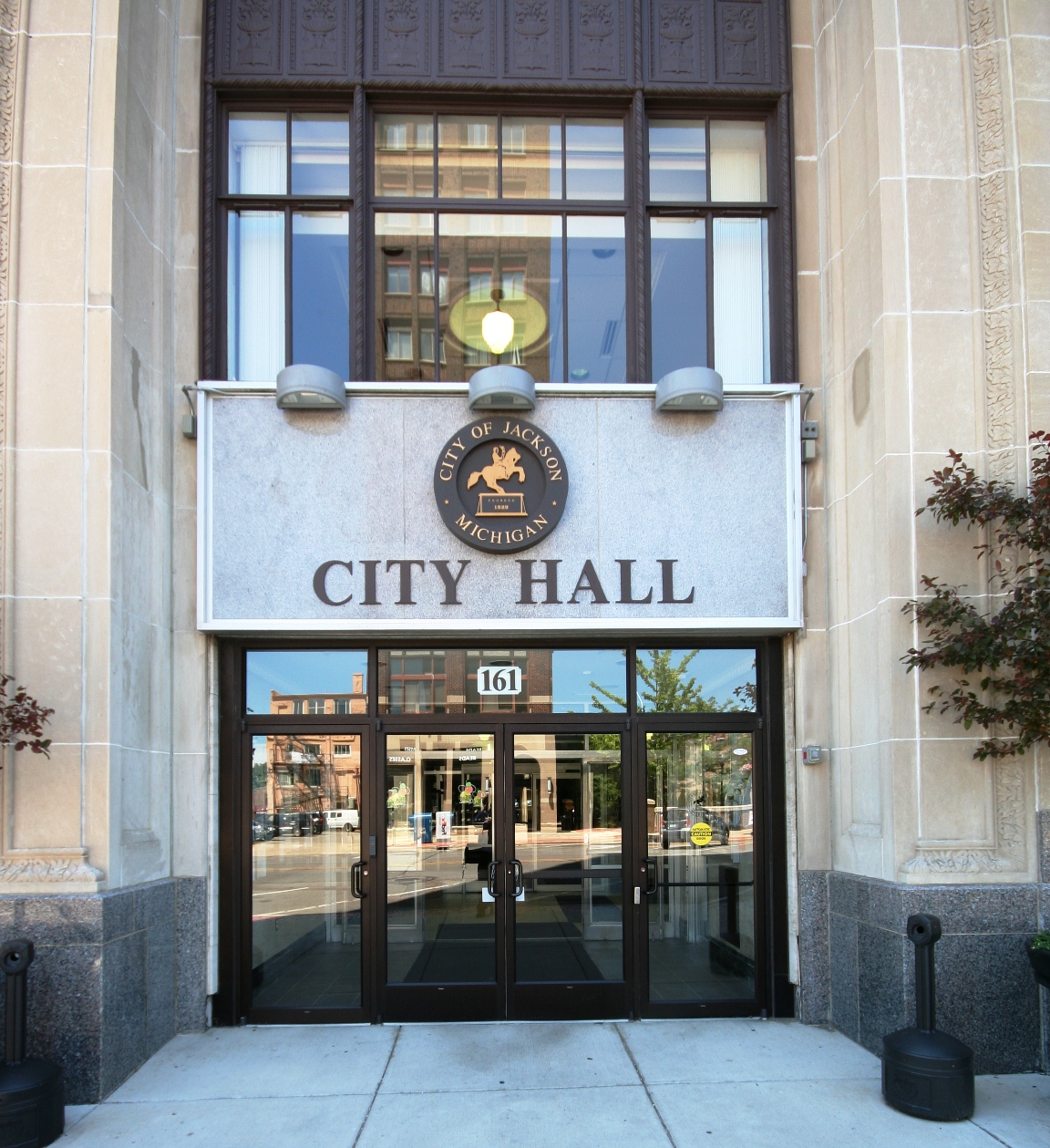 Jackson, Michigan City Hall sign and entrance. Image credit: flickr.com user OZinOH