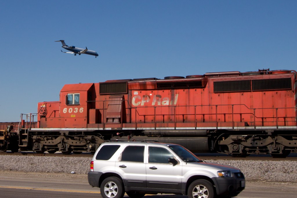 A plane, a train, and an automobile. Image credit: flickr.com user H. Michael Miley