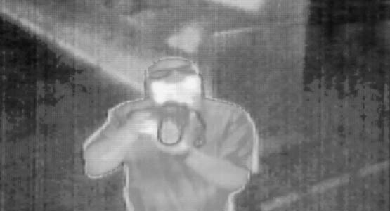 A thermal image of a man holding a camera. Image courtesy Michigan Engineering