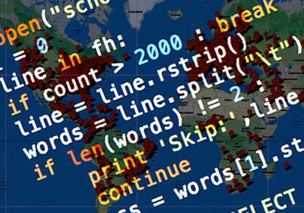 Programming code skewed over a world map. Image credlt: Coursera