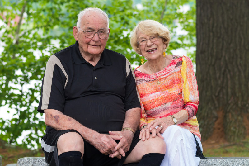A happy senior couple sitting together outside. Image credit: Ian Russell
