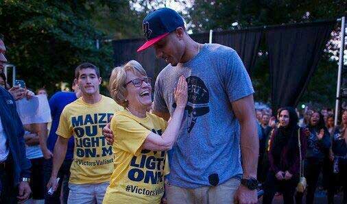 Twit pic of Jordan Morgan and Mary Sue Coleman.