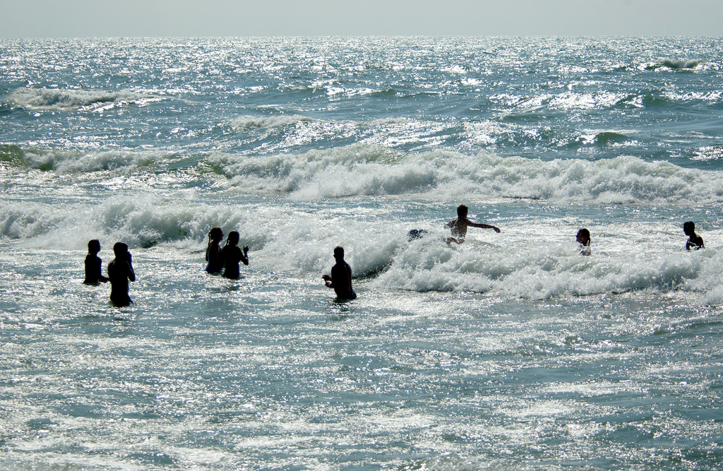 Swimmers playing in the surf, Lake Michigan. Image credit: Michigan Sea Grant