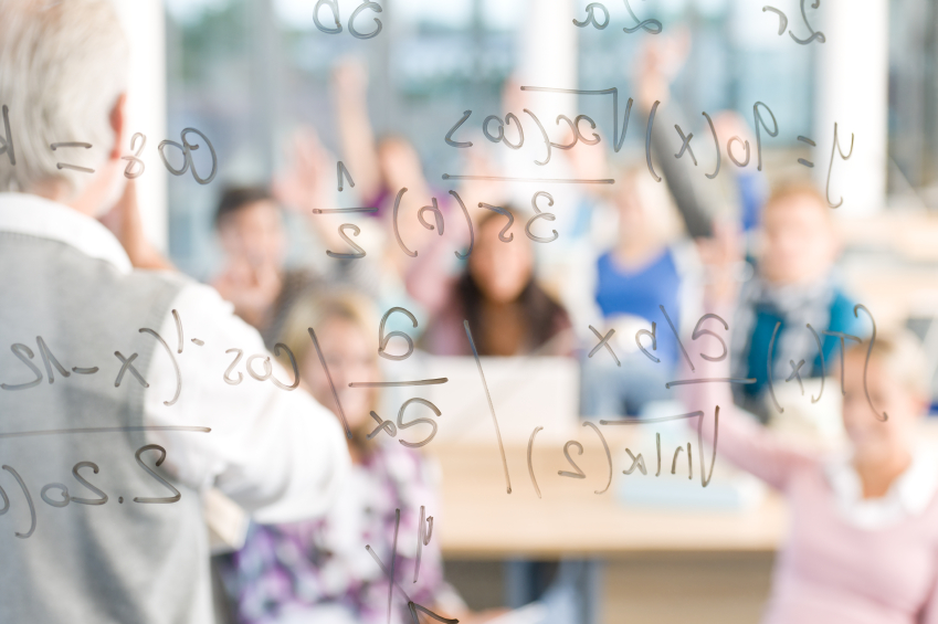 Math lesson in a high school classroom. (stock image)