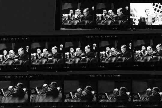 This contact sheet shows several images of composer/conductor Igor Stravinsky and Choral Union director Lester McCoy as they look over the score to Stravinsky's melodrama "Persephone" in rehearsals for the 1964 May Festival.