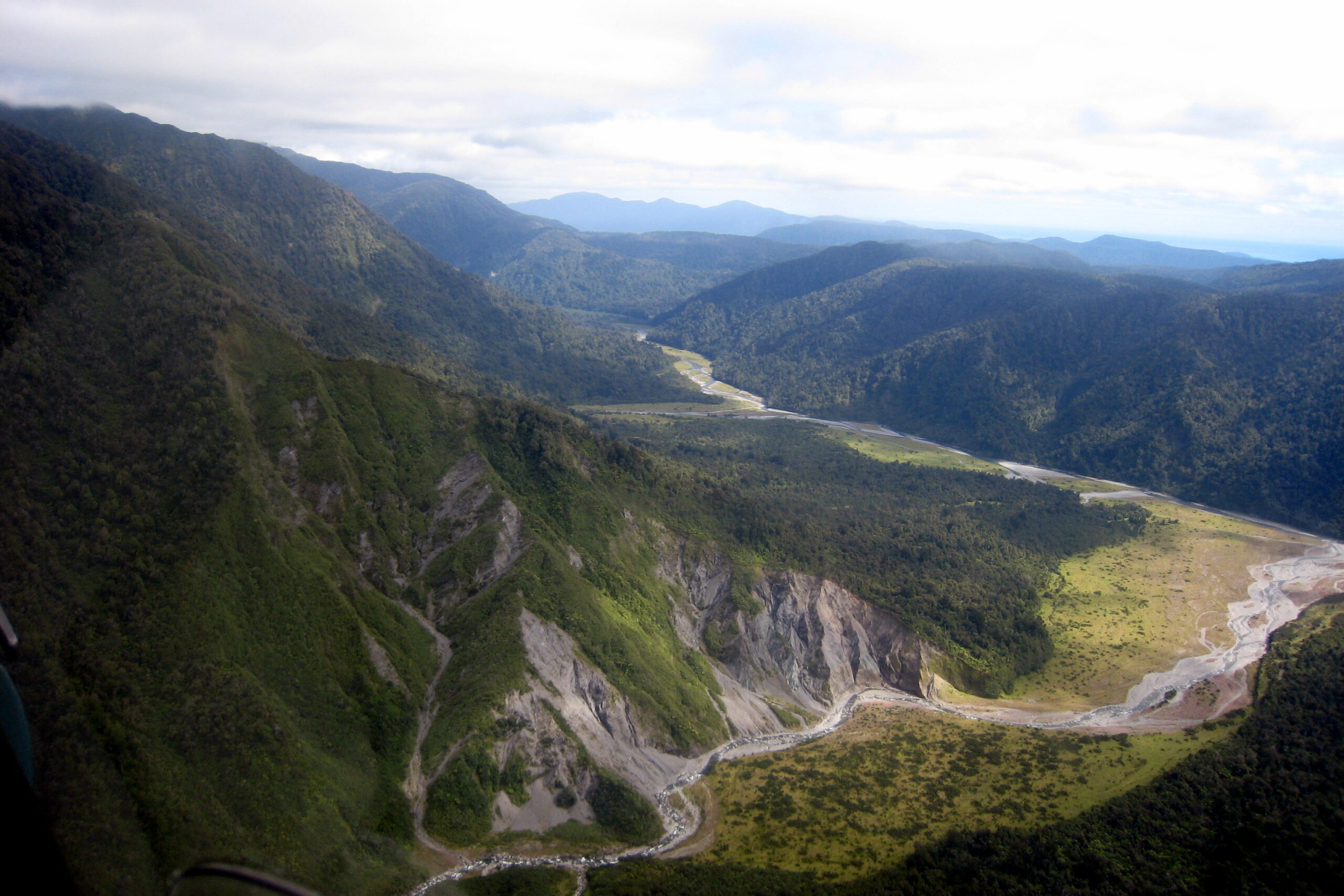 An aerial view of the Alpine Fault at Gaunt Creek, where the Deep Fault Drilling Project is scheduled to begin next month. Three University of Michigan geologists are participating in the $2.5 million international project, which will drill nearly a mile beneath the surface and return rock samples from an active fault known to generate major earthquakes. Image credit: Ben van der Pluijm