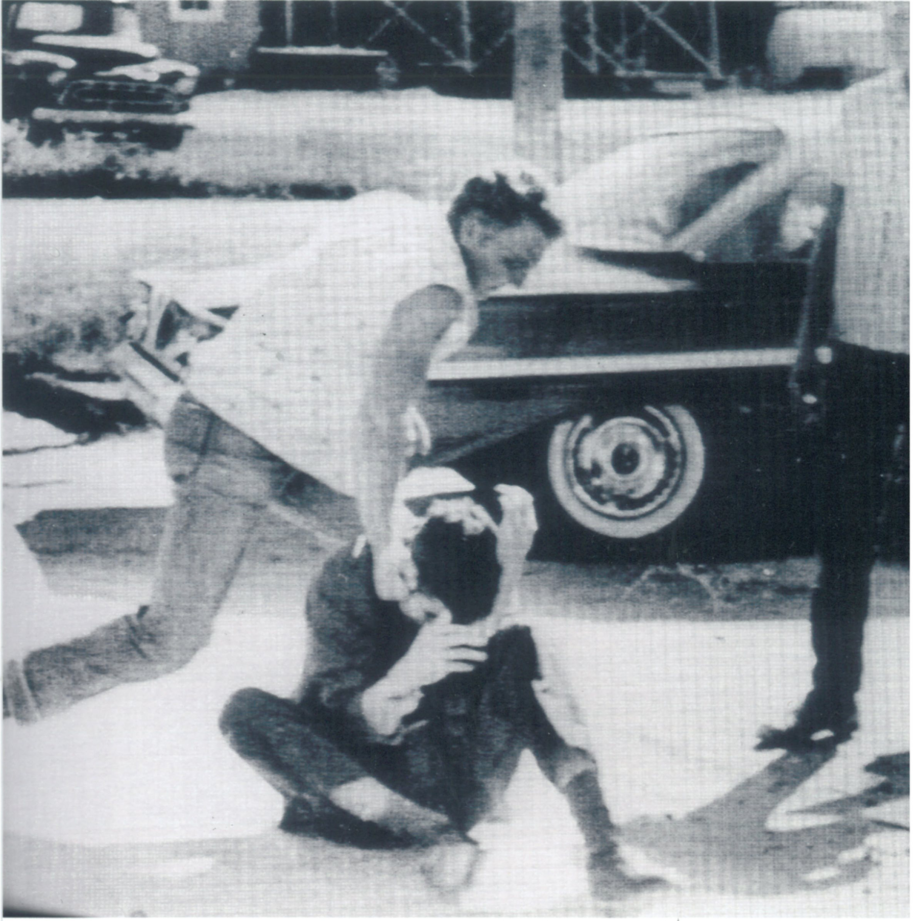 White supremacists pull Tom Hayden from a stopped car and beat him in McComb,  Mississippi, 1961. Image credit: Tom Hayden Papers held at the University of Michigan Library