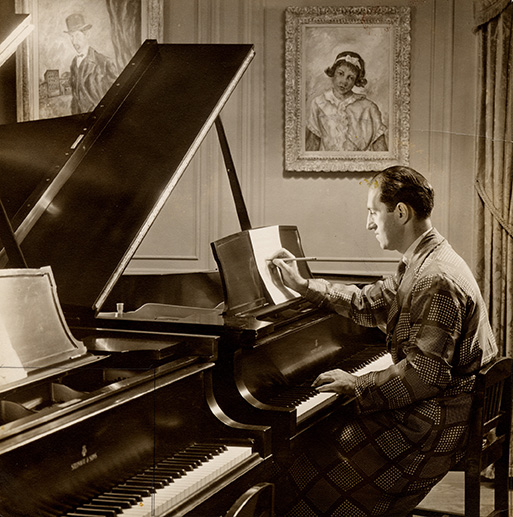 George Gershwin at the piano that was recently donated to the University of Michigan. Image credit: Ira Gershwin Archive