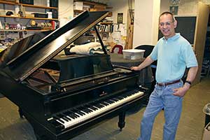 Grijalva at Gershwin piano.
