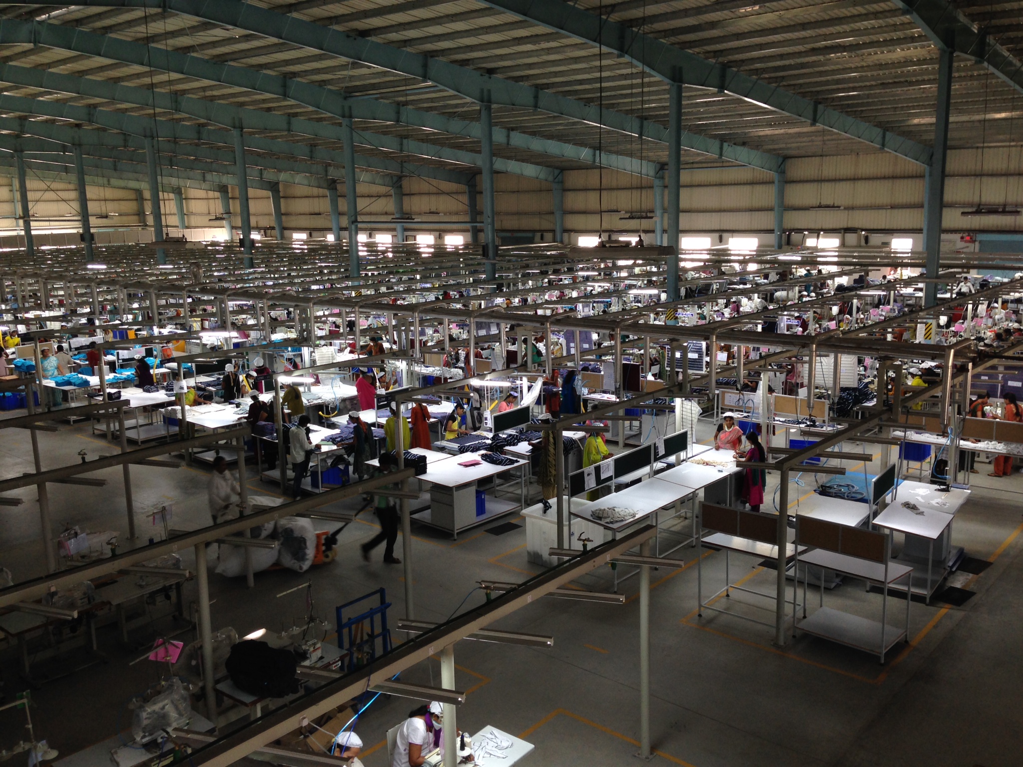 Garment factory in Bangalore, India with fluorescent lighting. Image credit: Achyuta Adhvaryu