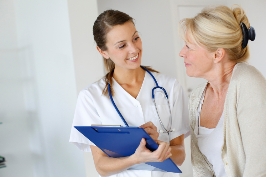 A doctor provides instruction to a patient. (stock image)