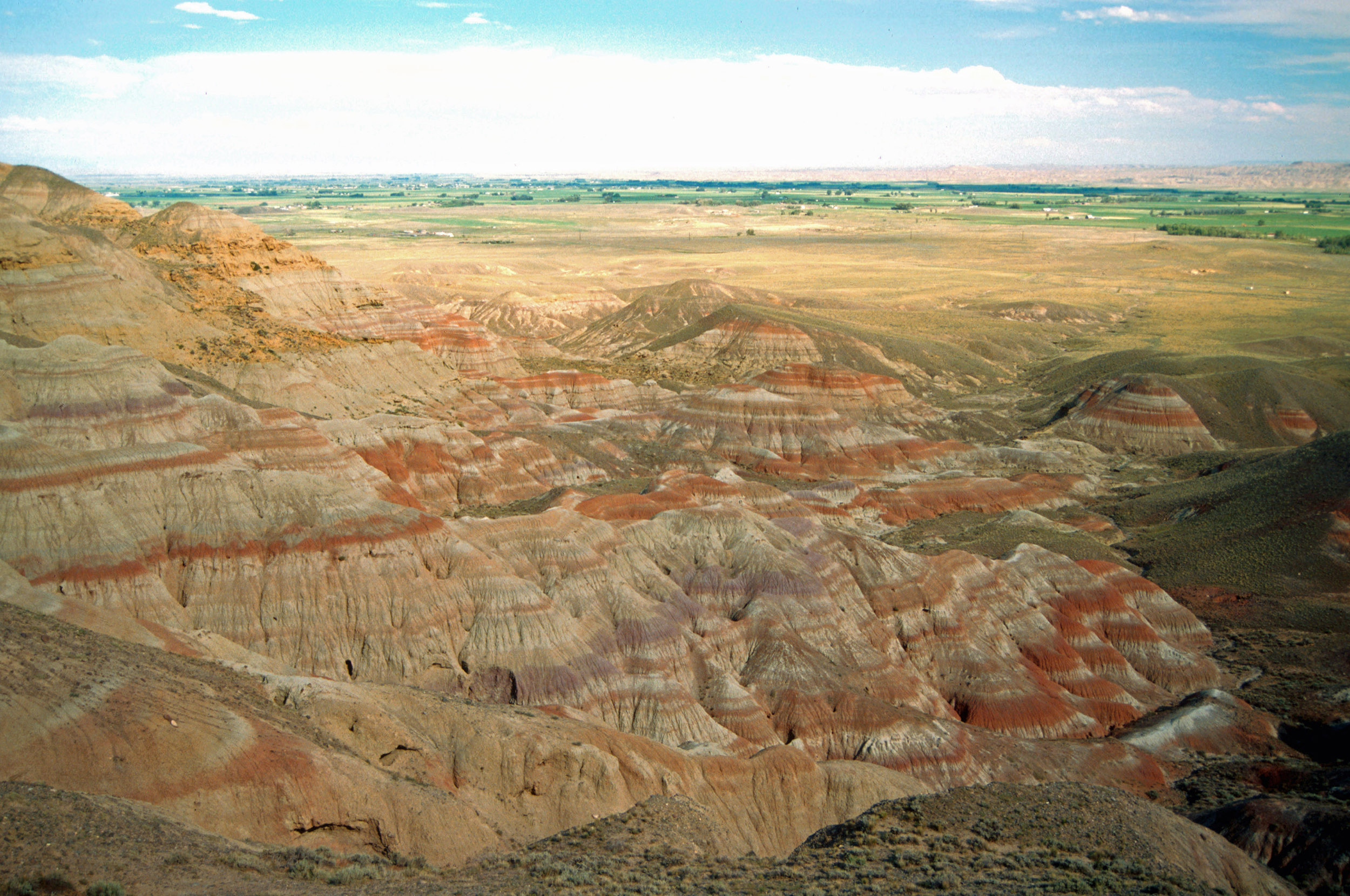 These banded sedimentary rock layers of the Willwood formation in Wyoming were drilled and   sampled to obtain details of a global warming period almost 56 million years ago. The study was led by   Gabe Bowen, an associate professor of geology and geophysics at the University of Utah, and published   Dec. 15 by the journal Nature Geoscience. Image credit: Scott Wing, Smithsonian Institution